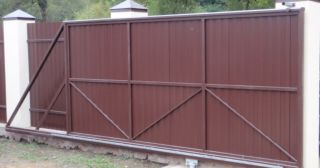 Купить откатные ворота из профнастила Люберцы, цена от 1750 руб.